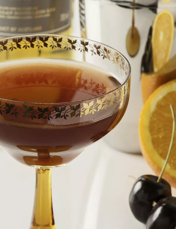 rob roy cocktail glass and fruit