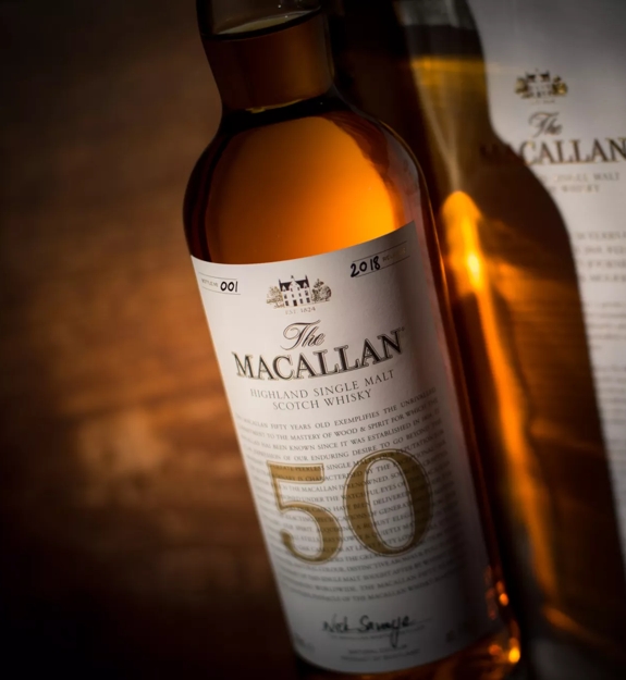 the macallan 50 years old 2018 release whisky bottle angled up close