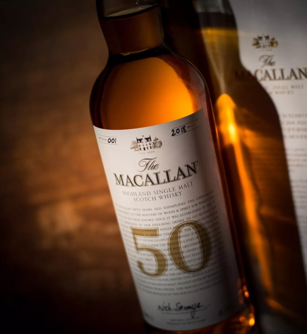 the macallan 50 years old 2018 release whisky bottle angled up close