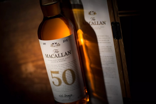 the macallan 50 years old 2018 release whisky bottle angled up close
