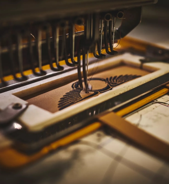 The Macallan and Bentley Stitching on Leather the logo