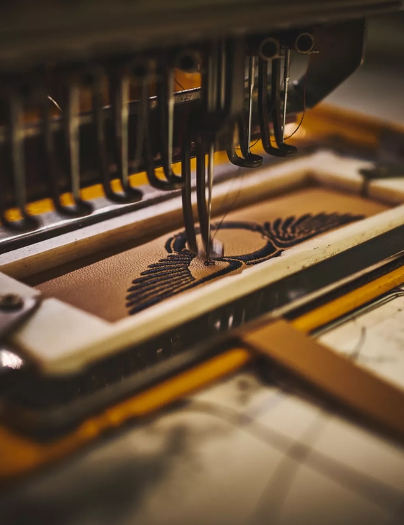 The Macallan and Bentley Stitching on Leather the logo