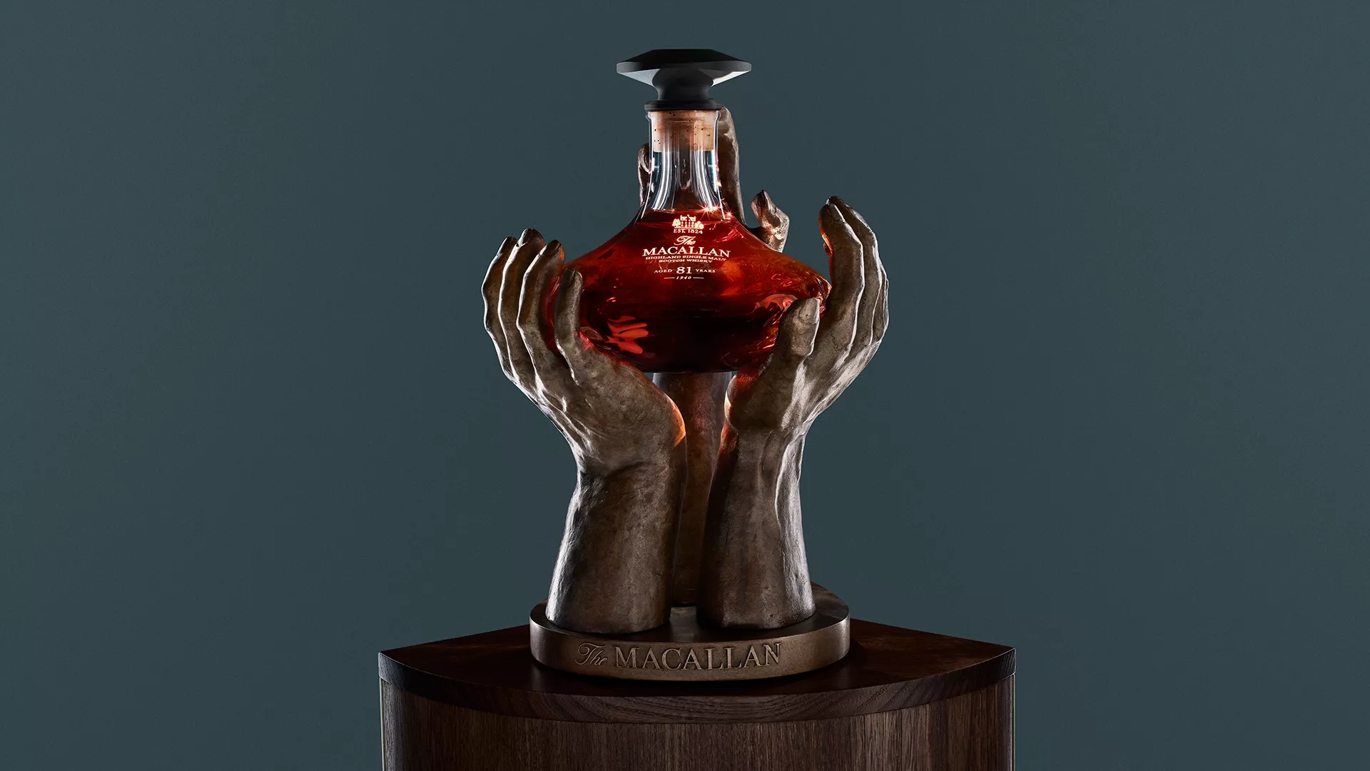 The Macallan The Reach Sculpture and bottle on blue background