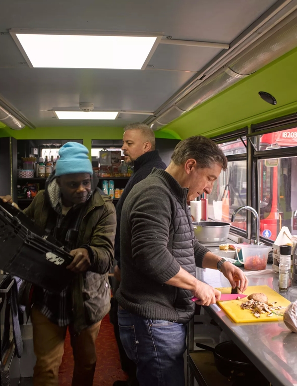 roca brothers inside food truck helping out