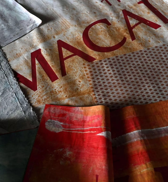 the macallan logo on canvas with print materials