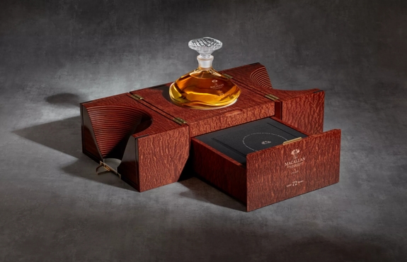 the macallan 72 years old whisky in lalique genesis decanter open box shot from side