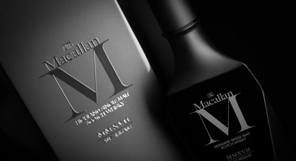 the macallan m black 2019 whisky bottle and pack close up