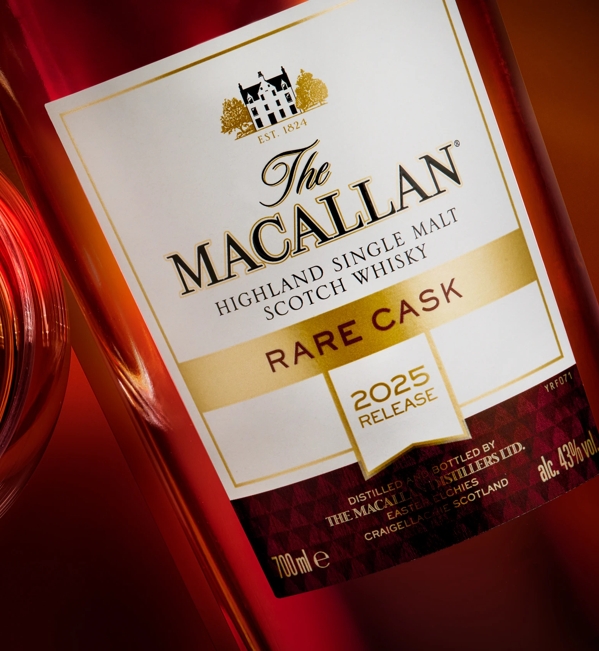 The Macallan Rare Cask 2025 bottle and glass with M