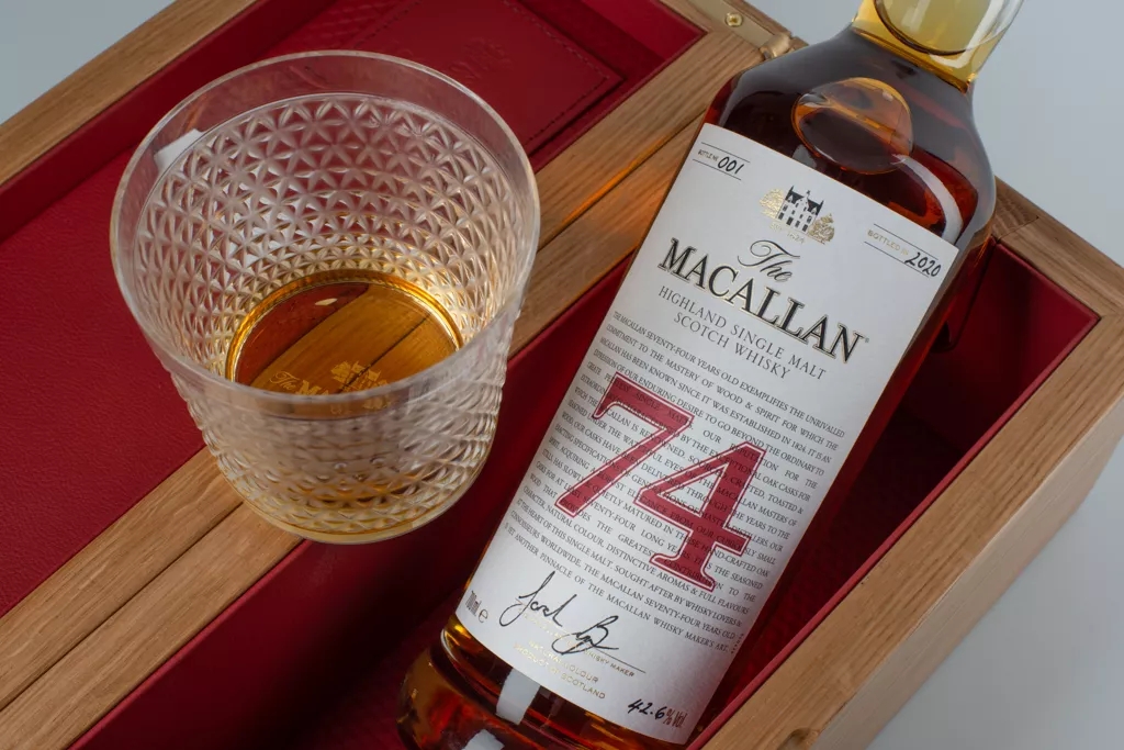The Macallan Red Collection 74 year old whisky bottle and glass in box