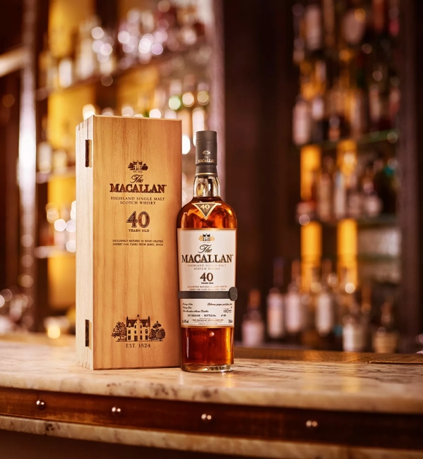 the macallan sherry oak 40 years old 2017 release whisky bottle and box in bar