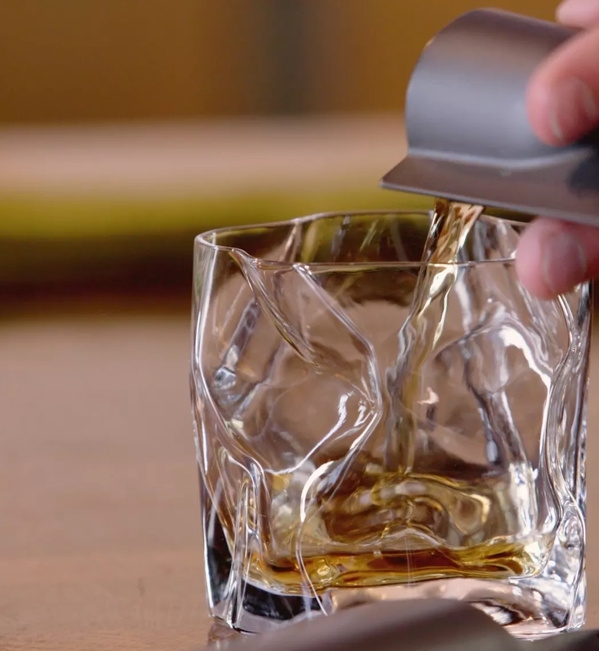 The Macallan Nurtured by Nature with Every Step Photography Dram Pouring