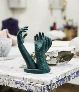 The Macallan The Reach Hand Sculpture on Table 
