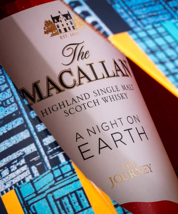 the macallan a night on earth the journey whisky bottle and packaging close up