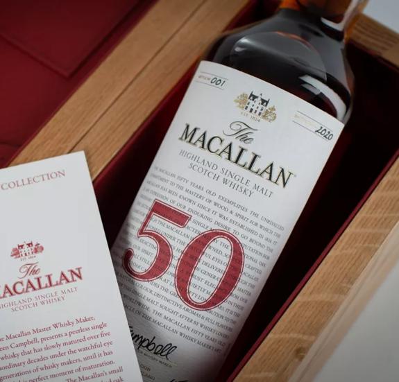 The Macallan red collection 50 year old whisky bottle and label close up