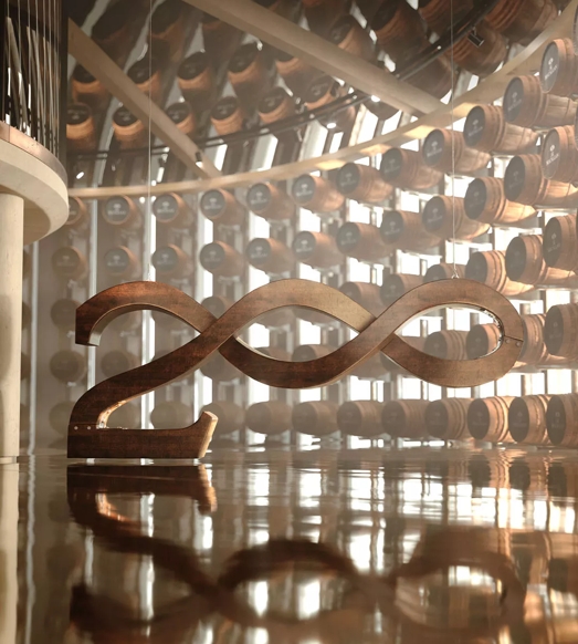 The Macallan 200 Years Logo with Casks in Background