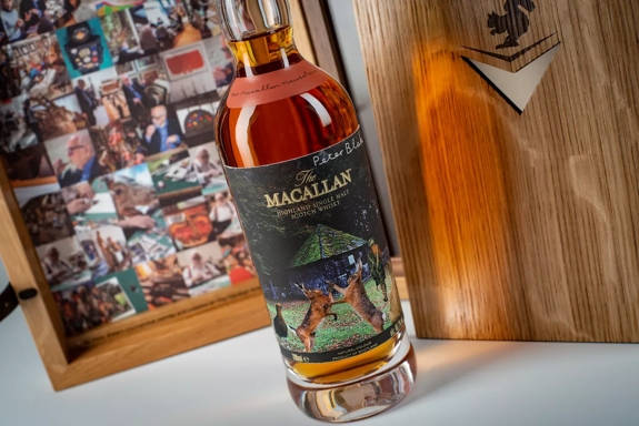 The Macallan Anecdotes of Ages Collection: The Macallan Mausoleum mood shot of bottle out pack with imagery in pack