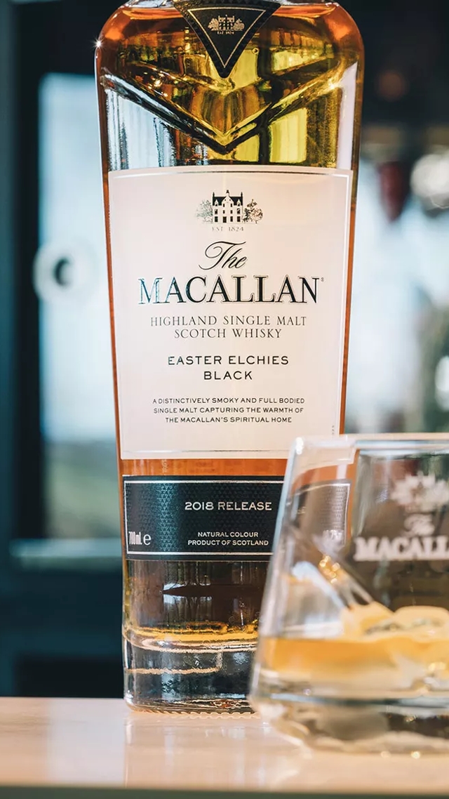 the macallan whisky bottle glasses and ice bucket