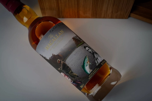 The Macallan Anecdotes of Ages Collection: The Giant and The Fish Mood Shot of Bottle Lying Flat