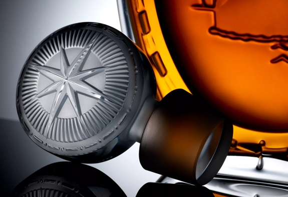 Golden Age of Travel Lalique Bottle and Stopper Mood Shot