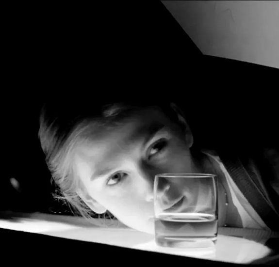 The Macallan Masters of Photography Albert Watson Woman Looking Through Glass