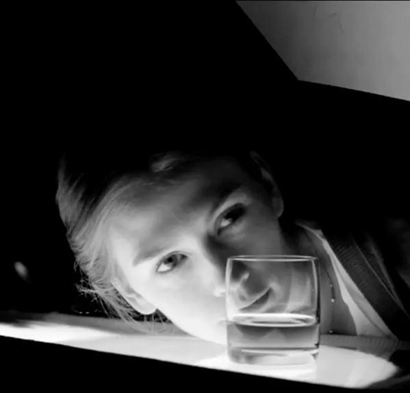 The Macallan Masters of Photography Albert Watson Woman Looking Through Glass