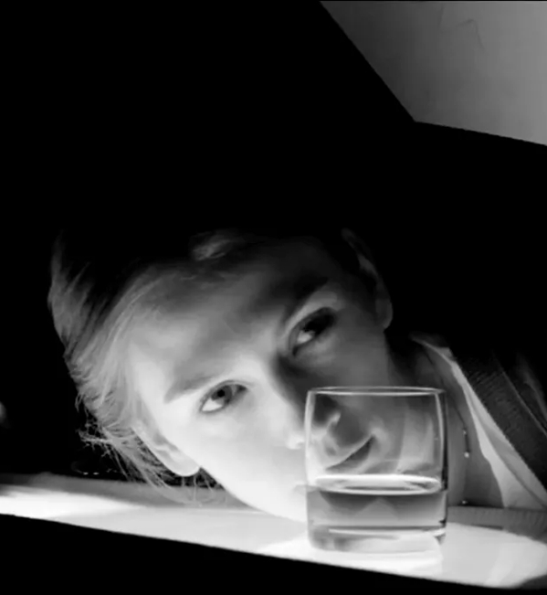 The Macallan Masters of Photography Albert Watson Woman Looking Through Glass