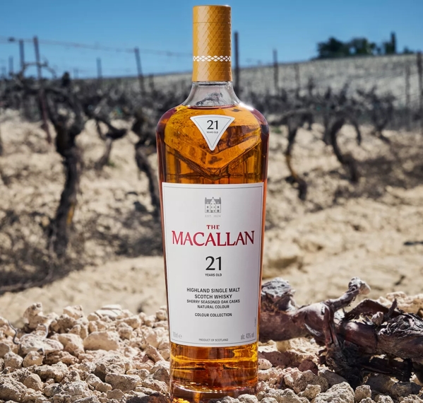 the macallan colour collection 21 year old whisky bottle in vineyard