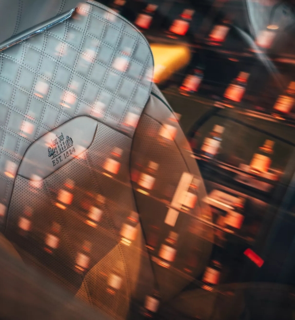 Reflection of lights on the Bentley car seat