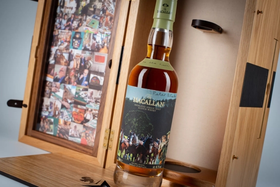 The Macallan Anecdotes of Ages Collection: The Old Farm Bottle out Box with Imagery in Box Mood shot