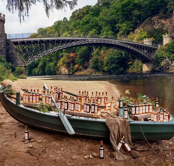 the macallan fine and rare bottles on boat by the river