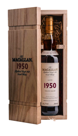 The macallan fine and rare 1950 whisky bottle inside open box