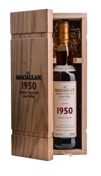 The macallan fine and rare 1950 whisky bottle inside open box