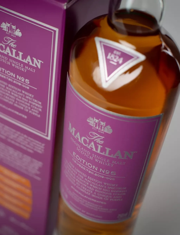 The Macallan Edition No.6 Angled Bottle and Pack Atmospheric Shot