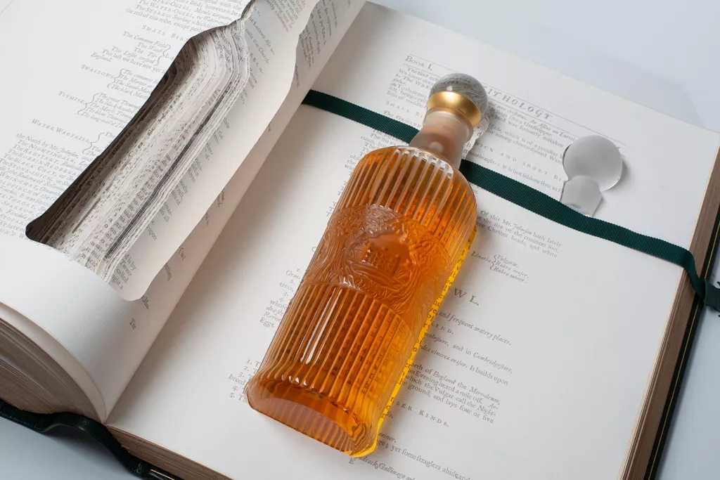 Tales of The Macallan whisky bottle inside book