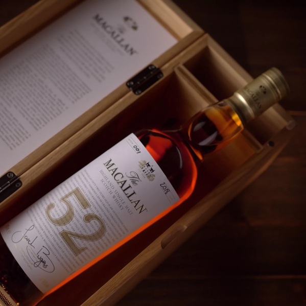 the macallan 52 years old 2018 release whisky bottle inside open box
