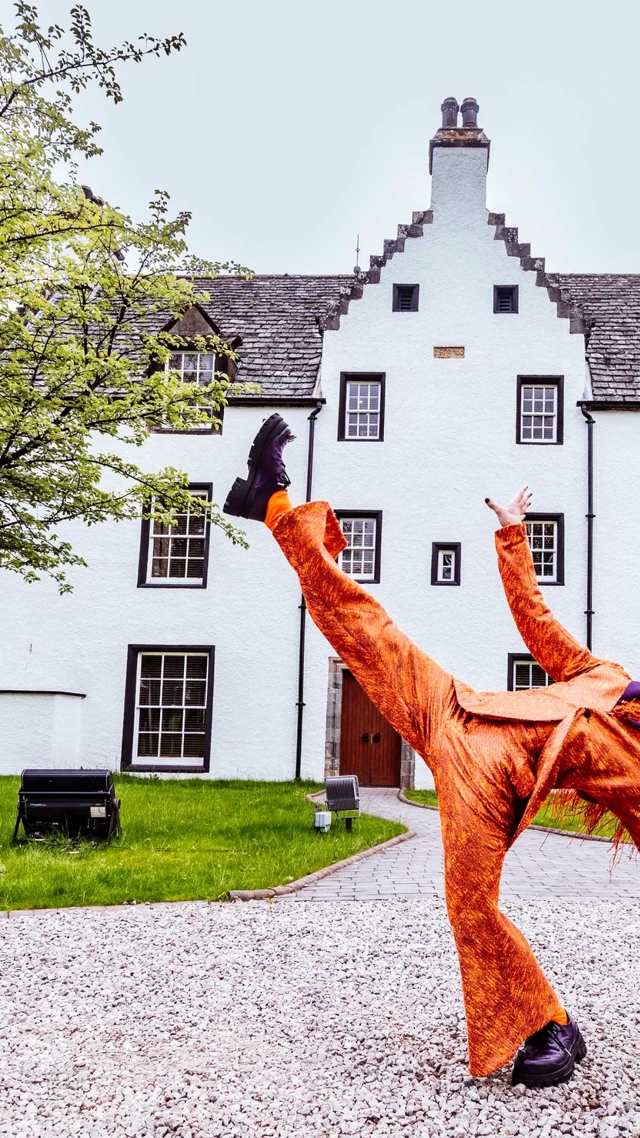 The Macallan Launches Cirque du Soleil at The Macallan Estate Fox Performer in front of Easter Elchies House