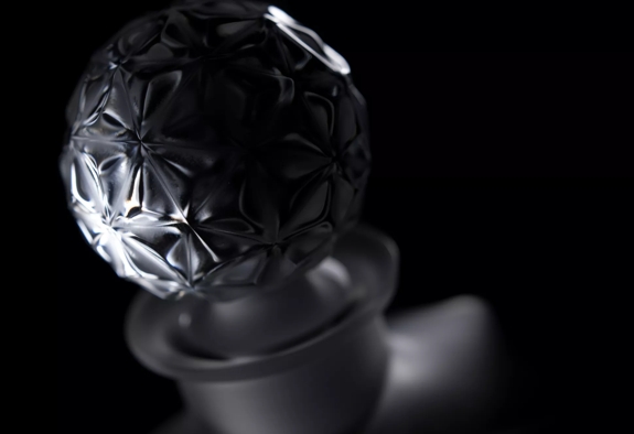 The Macallan Lalique 65 bottle top mood shot
