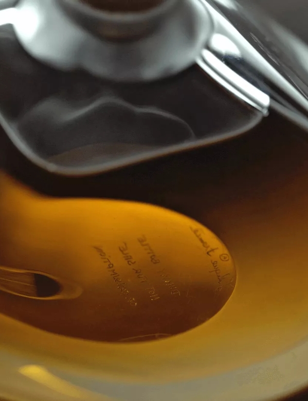Sustainable Packaging Lalique Bottle