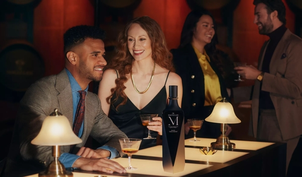 The Macallan M Collection Lifestyle Couple Talking in Bar