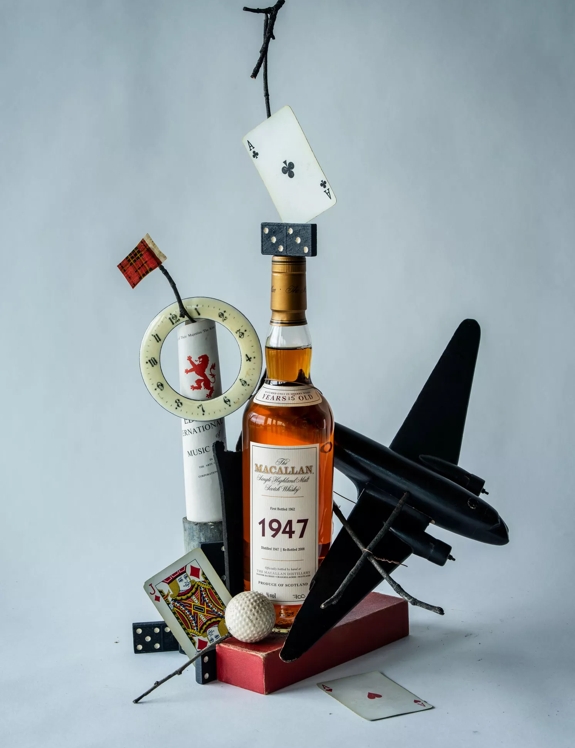 The Macallan Fine and Rare 1940s Bottle with Objects Unique to 40s