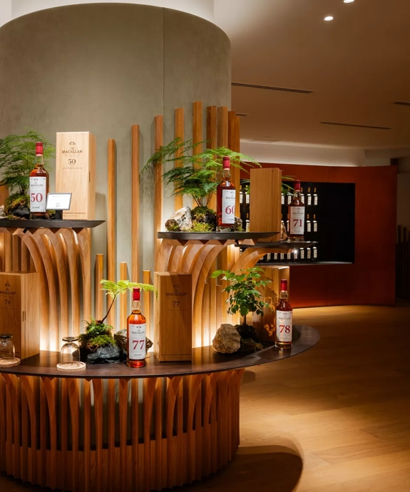 The Macallan House Hong Kong Wall feature with bottles displayed