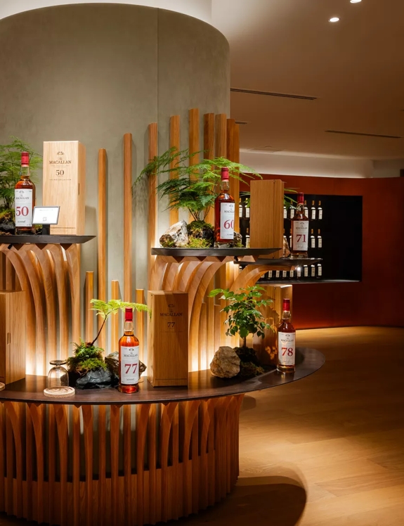 The Macallan House Hong Kong Wall feature with bottles displayed