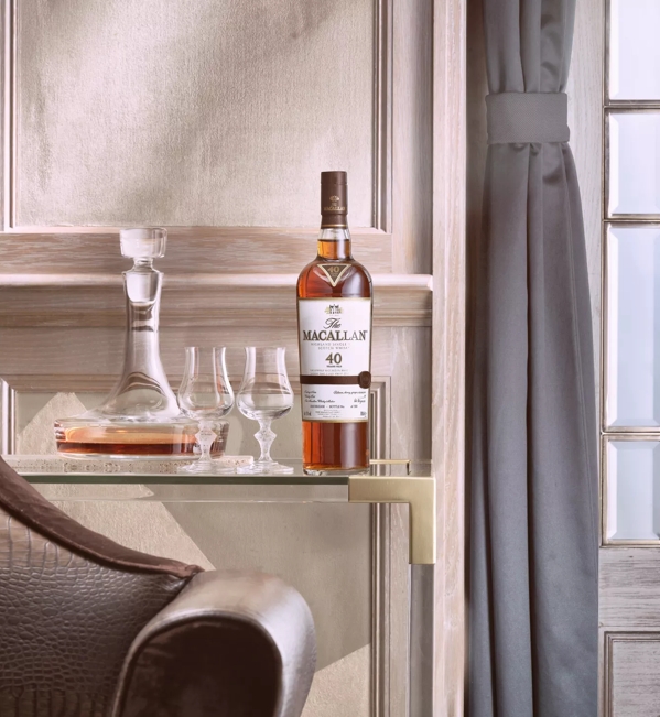 the macallan sherry oak 40 years old 2016 release whisky bottle and glasses in lounge
