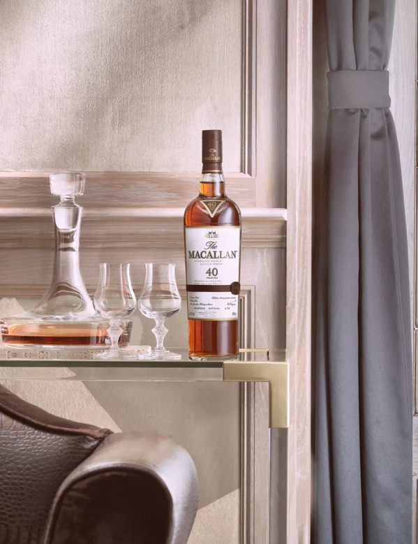 the macallan sherry oak 40 years old 2016 release whisky bottle and glasses in lounge