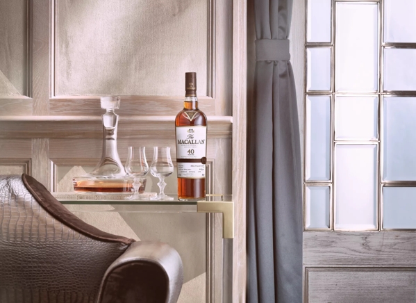 the macallan sherry oak 40 years old 2016 release whisky bottle and glasses in lounge