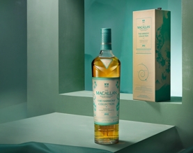 bottle and box of The Macallan Harmony Inspired By Honey Orchid Tea
