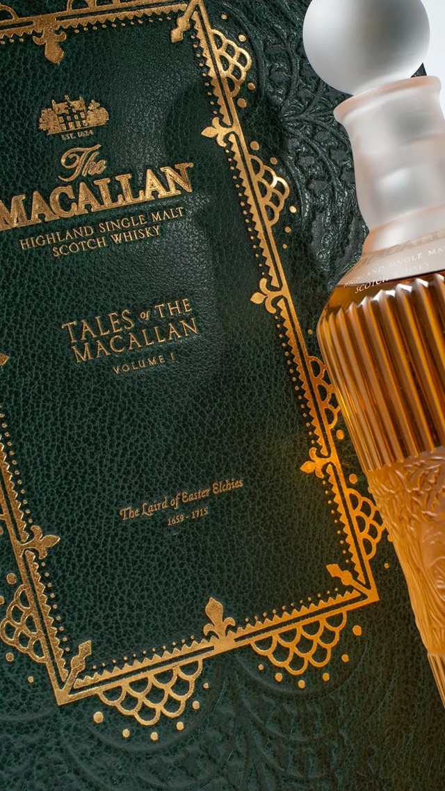 Tales of The Macallan whisky bottle and book close up