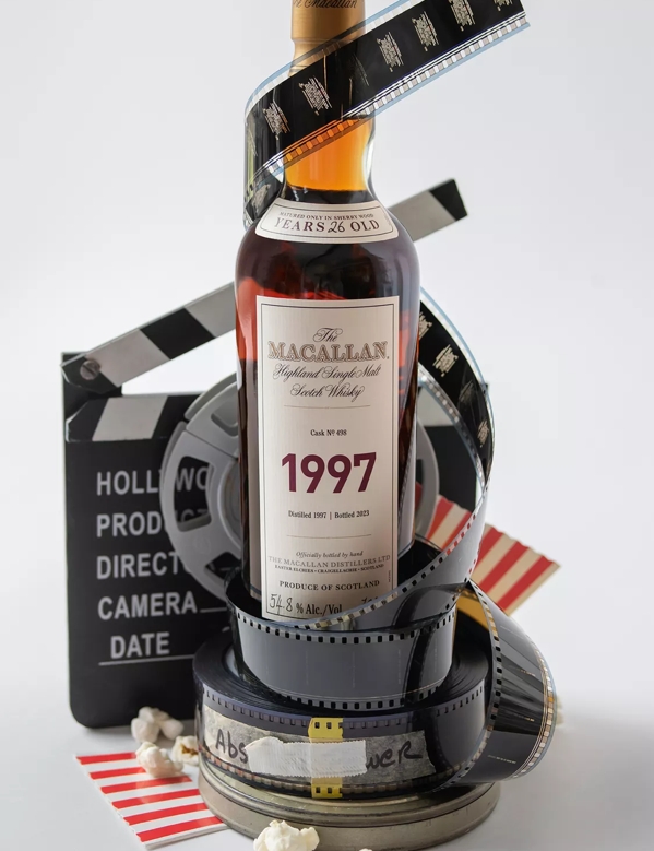 The Macallan Fine and Rare 1997 movie shot bottle with tape and popcorn