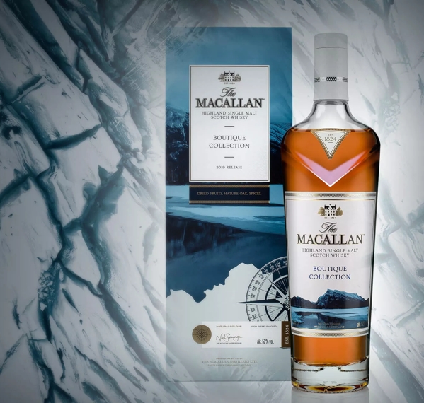 the macallan boutique collection bottle and pack on abstract background 