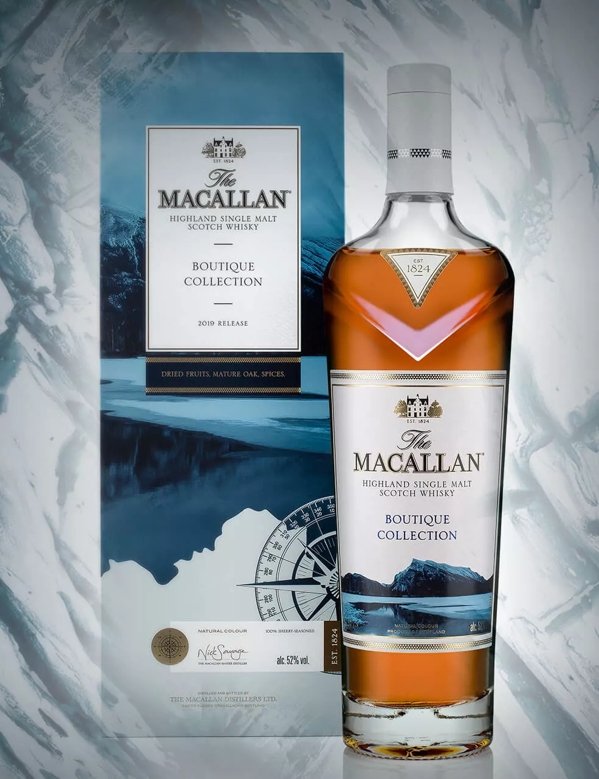 the macallan boutique collection bottle and pack on abstract background 